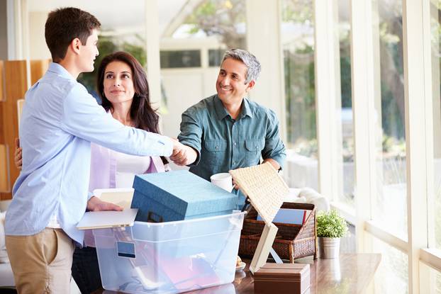 Parents,Helping,Teenage,Son,Pack,For,College