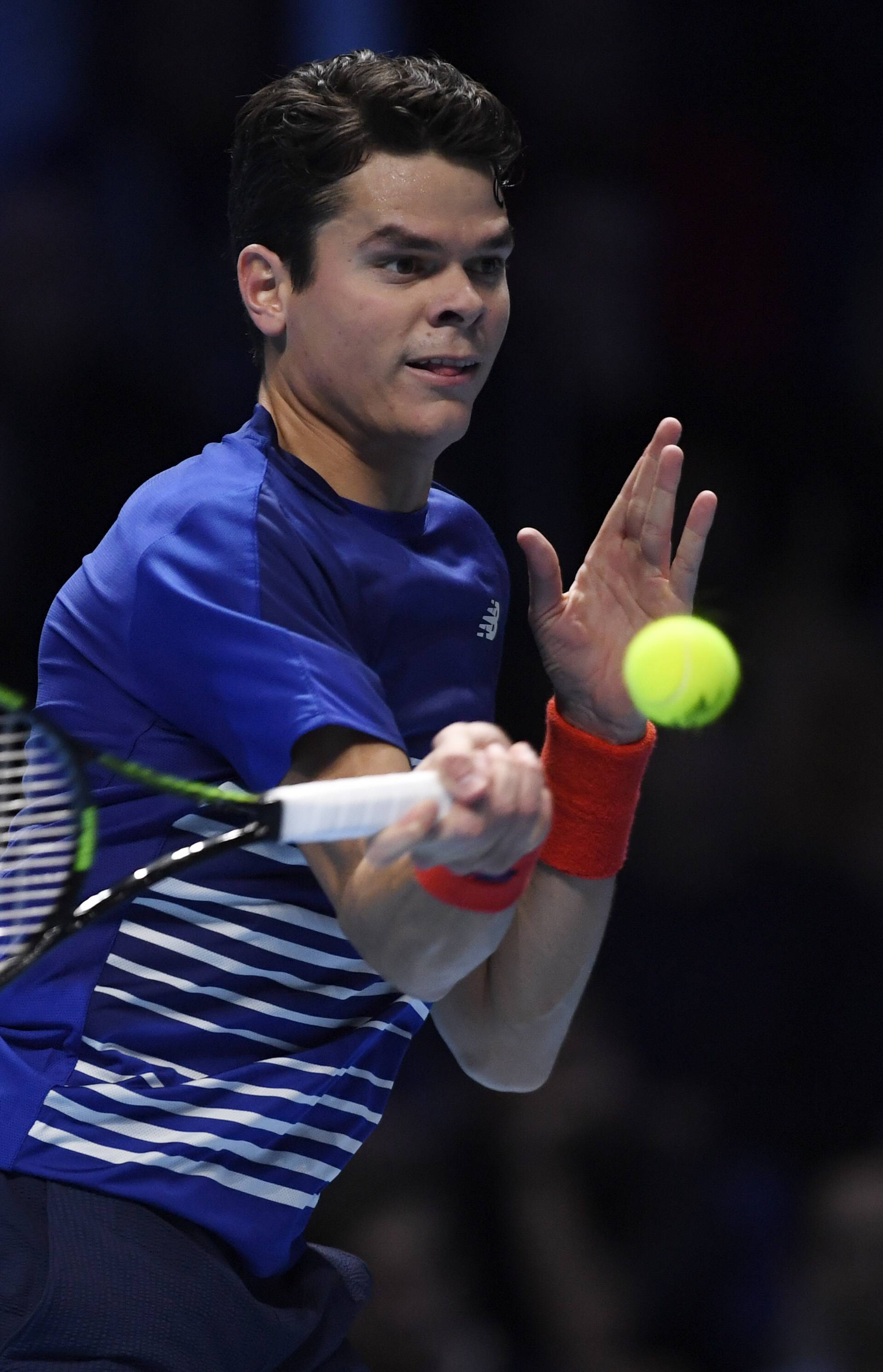 Canada's Milos Raonic in action during his round robin match with Serbia's Novak Djokovic