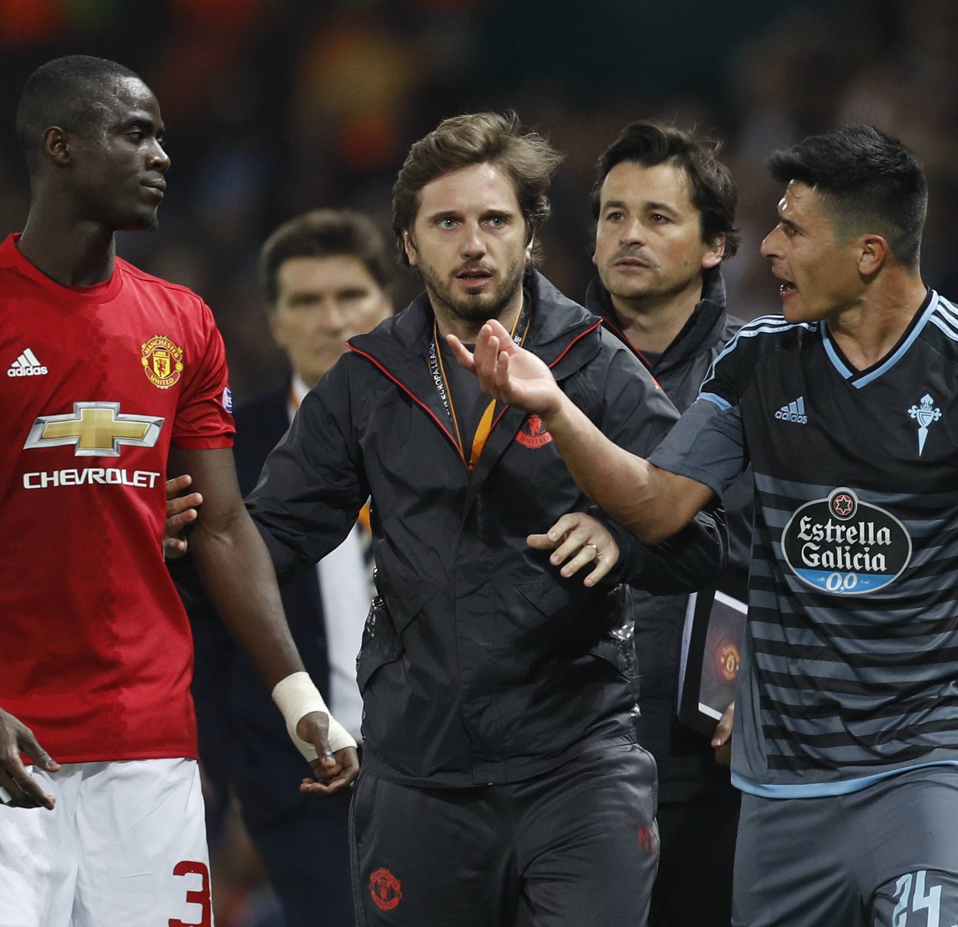 Manchester United's Eric Bailly clashes with Celta Vigo's Facundo Roncaglia after both are sent off