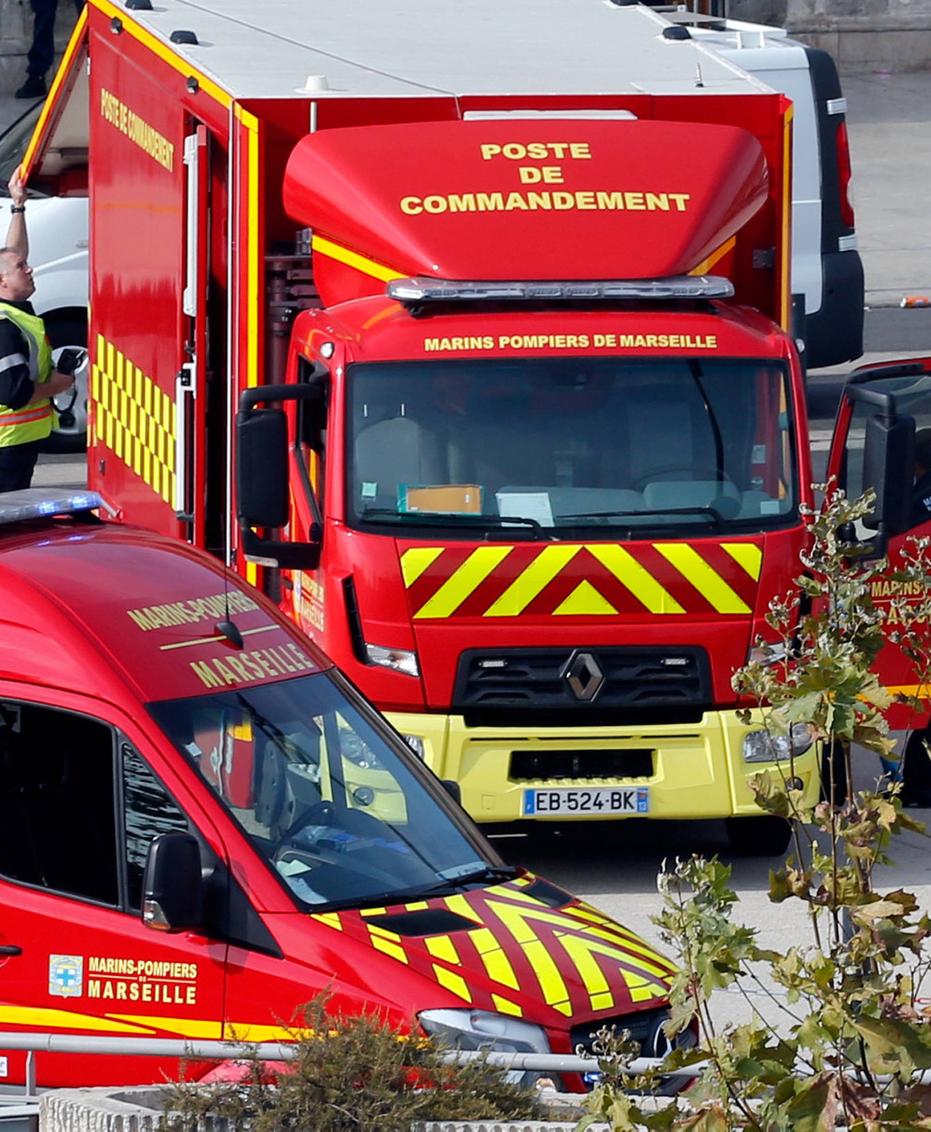 Emergency services vehicles are seen outside the Saint-Charles train station after French soldiers shot and killed a man who stabbed two women to death at the main train station in Marseille
