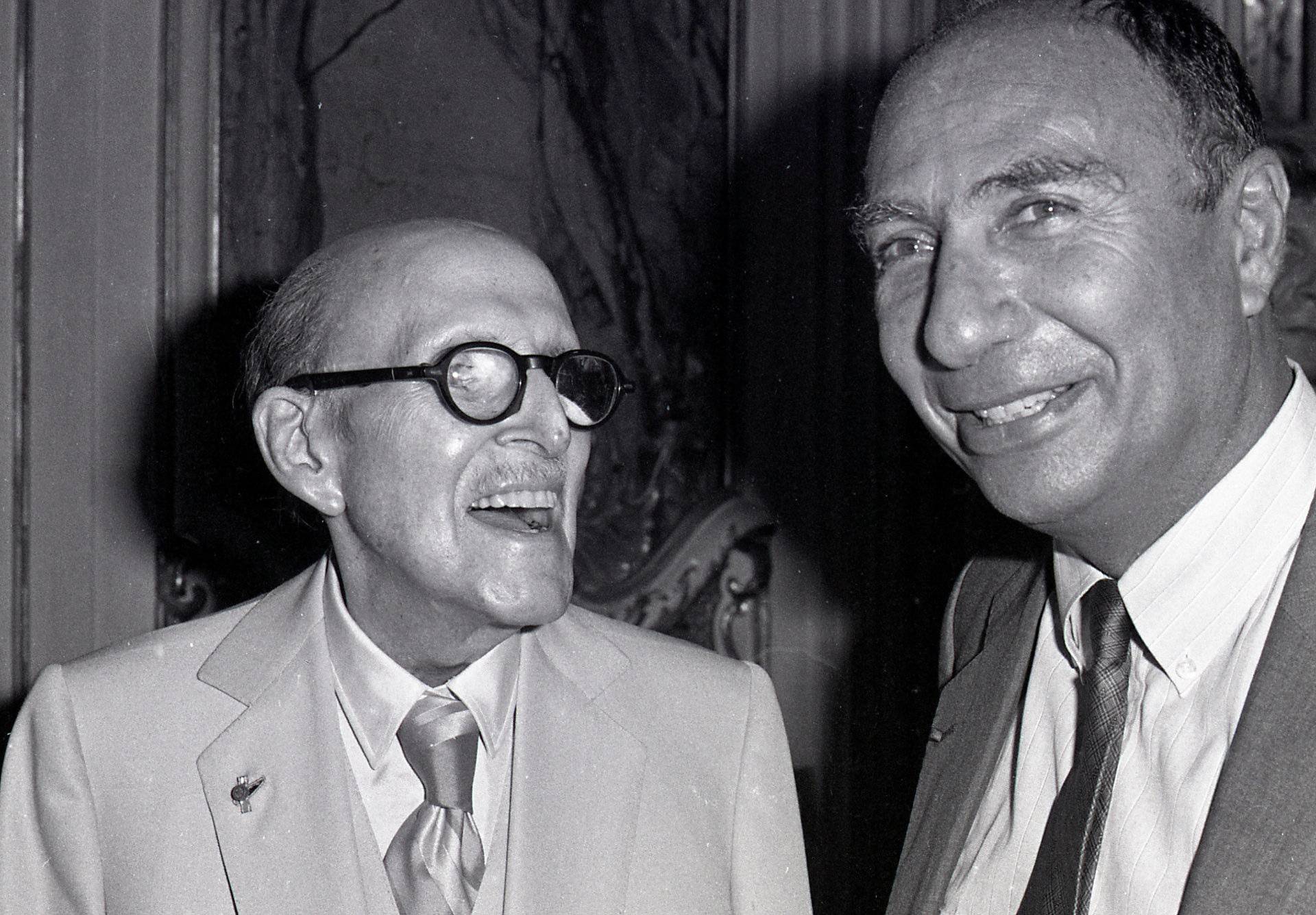 FILE PHOTO: Marcel Dassault, French aircraft industrialist and founder of Dassault Aviation, and his son Serge attend a news conference at the Jours de France offices in Paris