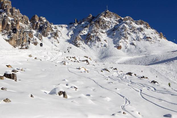 FILE PHOTO: A general view shows a off-piste area with rocks between slopes near the ski resort of Meribel, French Alps