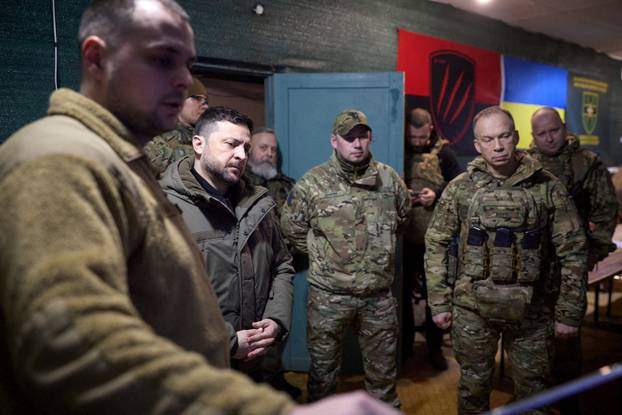 FILE PHOTO: Ukraine's President Zelenskiy visits a front line in Donetsk region