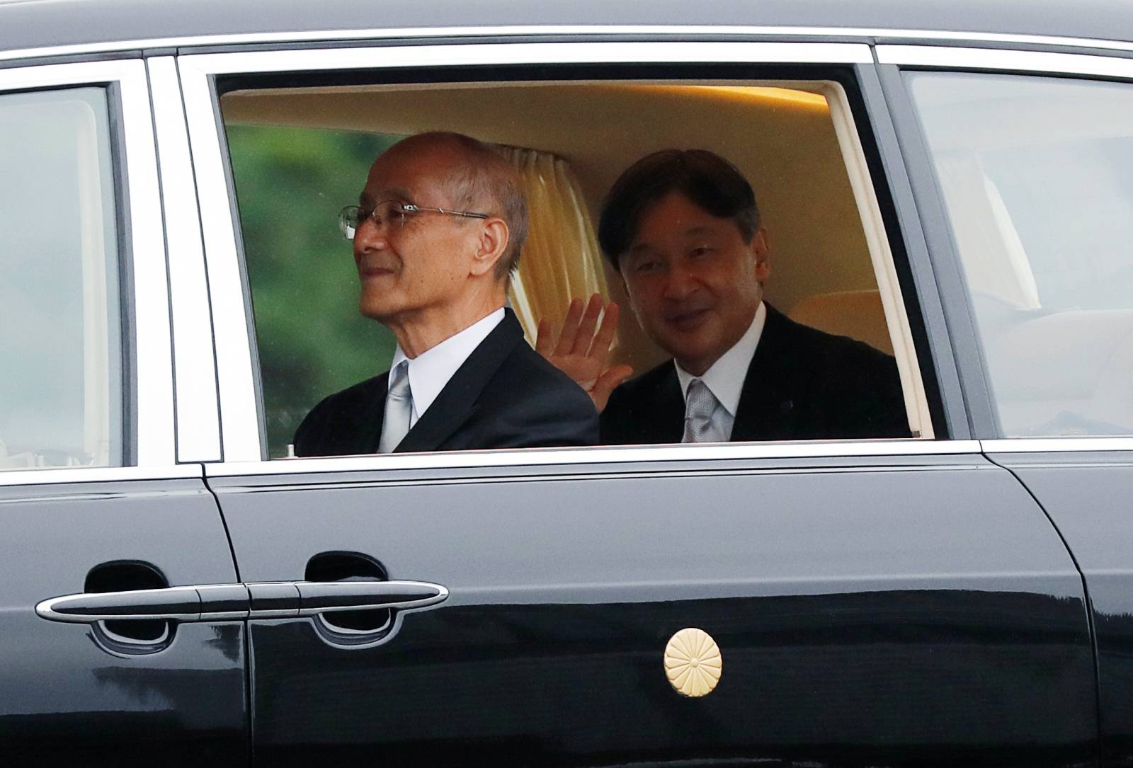 Japan's Emperor Naruhito departs the Imperial Palace after his enthronement ceremony in Tokyo