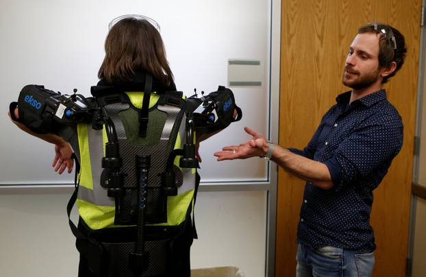 Ford Motor Co ergonomic Marty Smets talks about the exoskeletal technology EksoVest being tested at Wayne Assembly plant in Wayne