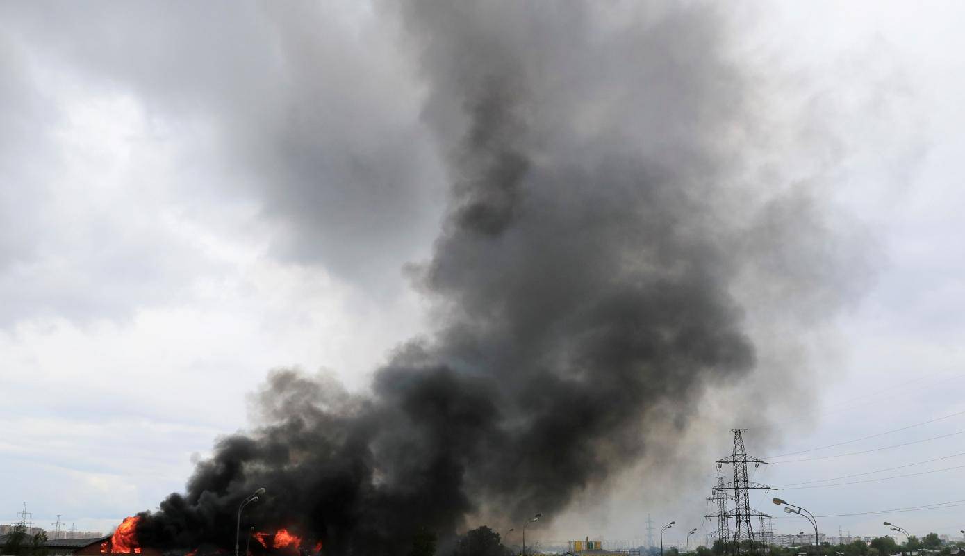 Flames and smoke rise from a fire at an electricity generating power station in Moscow region