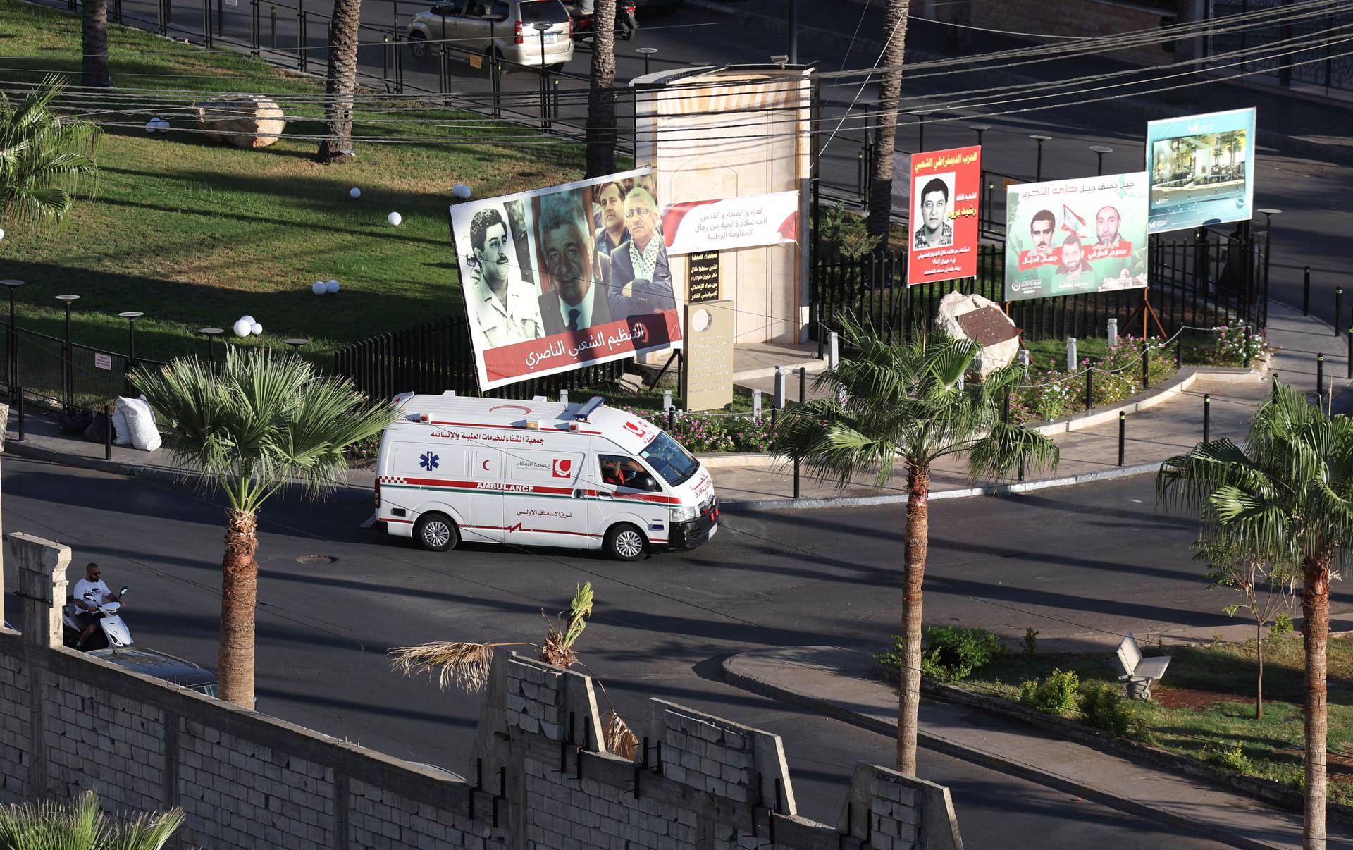 An ambulance drives, as more than 1,000 people, including Hezbollah fighters and medics, were wounded on Tuesday when the pagers they use to communicate exploded across Lebanon, according to a security source, in Sidon