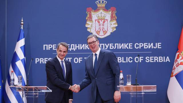 Greek Prime Minister Kyriakos Mitsotakis attends a press conference with Serbian President Aleksandar Vucic in Belgrade