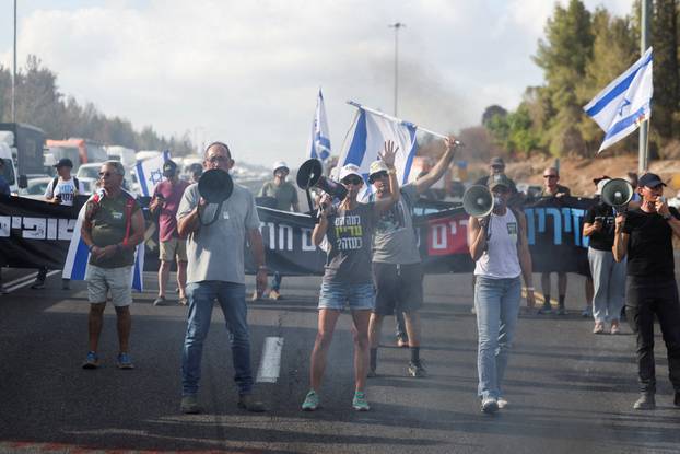 People block Israel's main highway connecting Jerusalem and Tel Aviv near Latrun