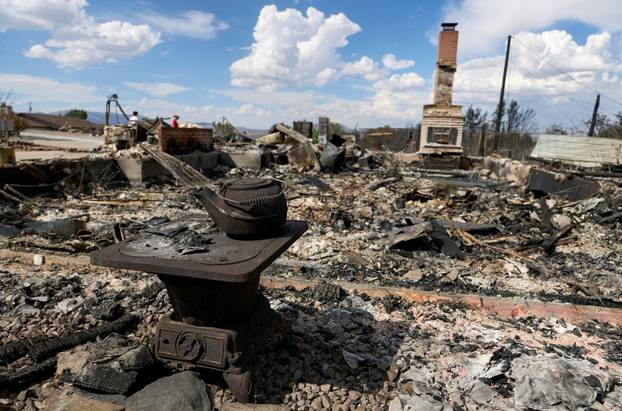 An old stove and teakettle near burned home at Hawk Fire in Reno