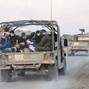 Israel's military transports Palestinian detainees from the Gaza Strip, amid the ongoing conflict between Israel and the Palestinian Islamist group Hamas, near Israel's border with Gaza