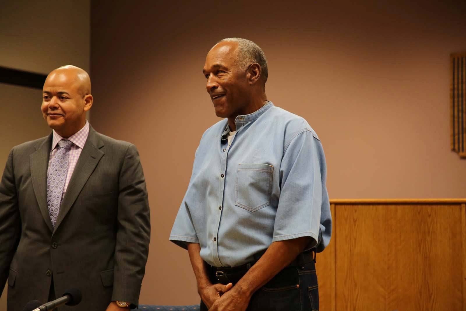O.J. Simpson arrives for his parole hearing with attorney Malcolm LaVergne