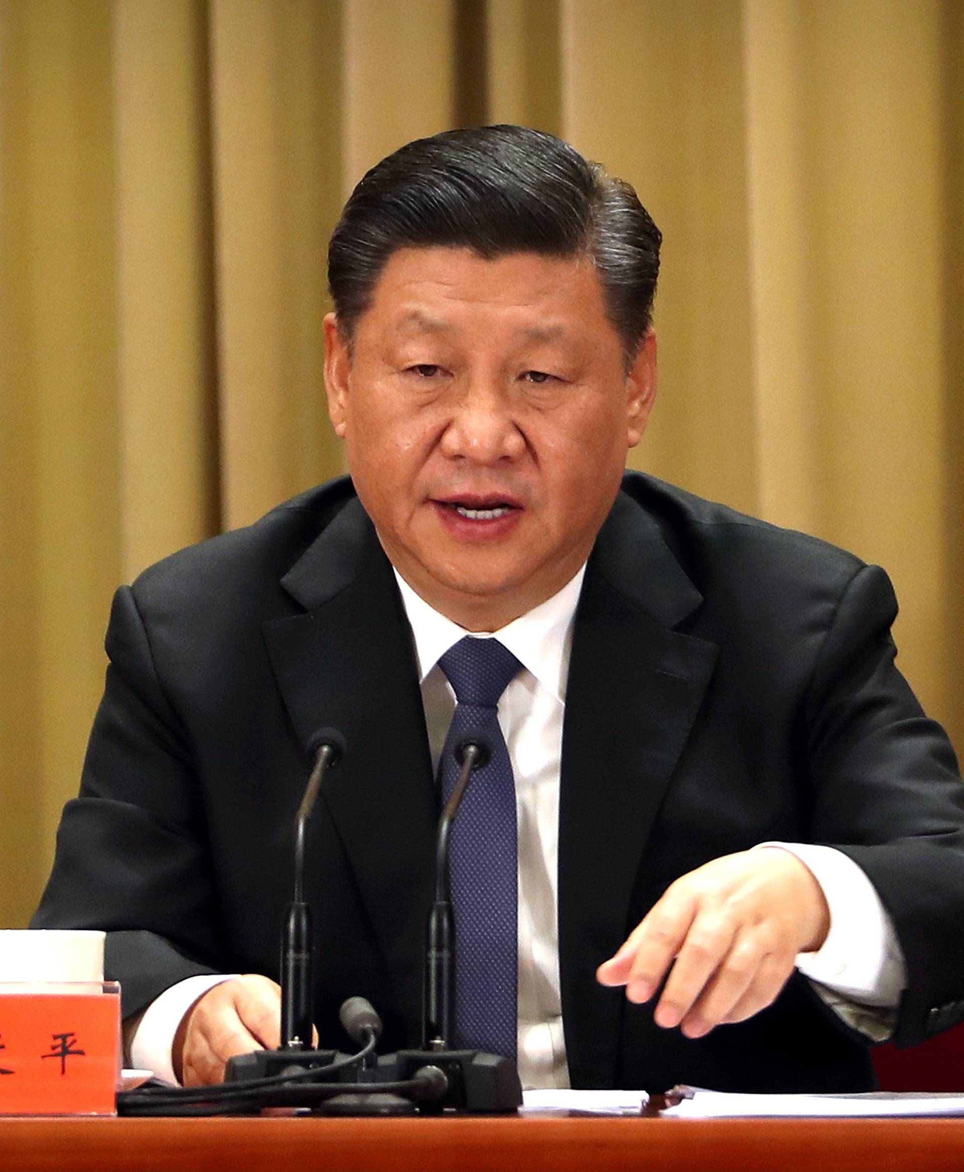 Chinese President Xi Jinping speaks during an event to commemorate the 40th anniversary of the "Message to Compatriots in Taiwan" at the Great Hall of the People in Beijing