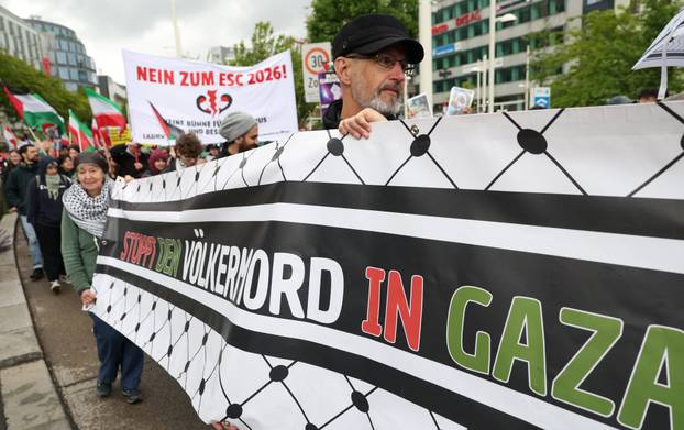 People attend a protest against Israel's participation in the Eurovision Song Contest, in Vienna