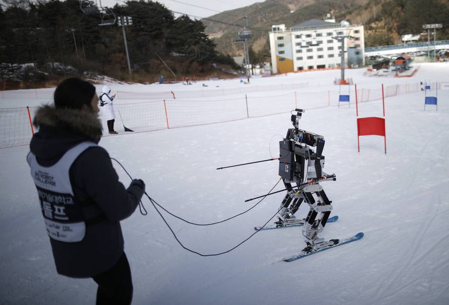 A robot skis during practice at the Ski Robot Challenge at a ski resort in Hoenseong