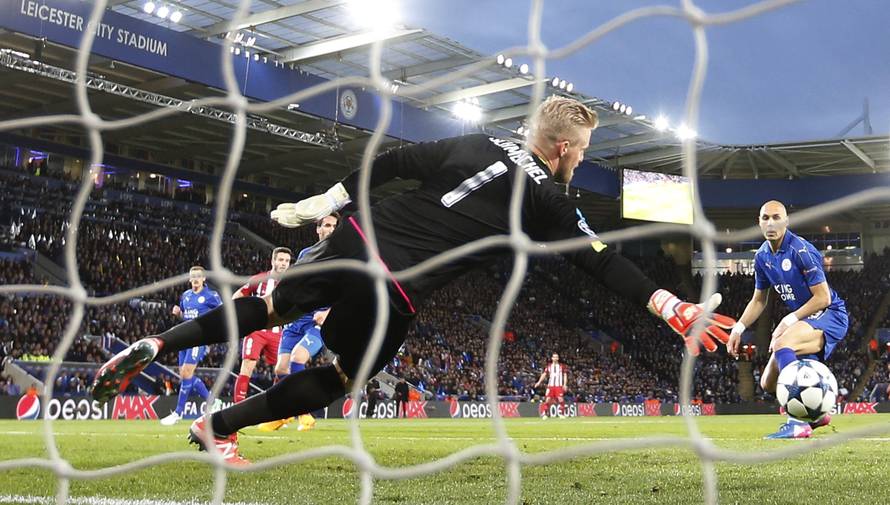Atletico Madrid's Saul Niguez scores their first goal