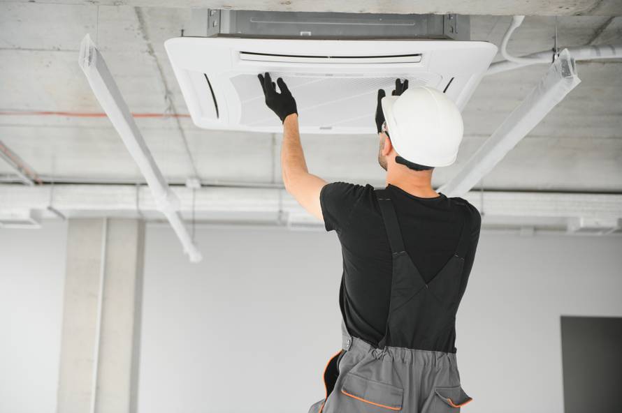 Young,Male,Electrician,Repair,Conditioner.