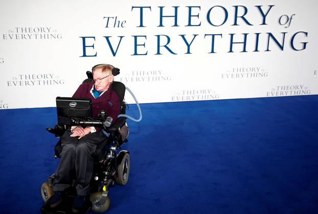 FILE PHOTO: Stephen Hawking arrives at the UK premiere of the film "The Theory of Everything" which is based around his life, at a cinema in central London