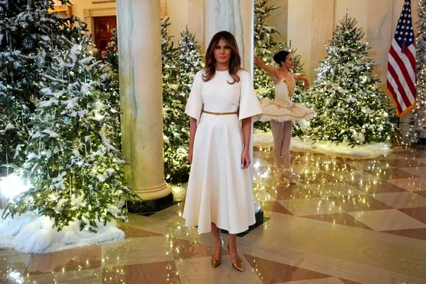 Trump tours the holiday decorations with reporters at the White House in Washington