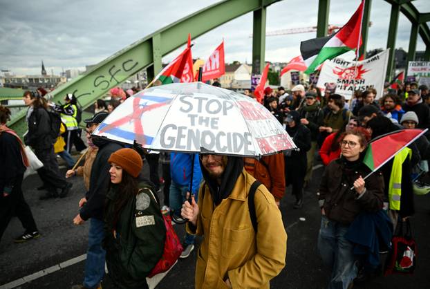 People attend a protest against Israel's participation in the Eurovision Song Contest, in Vienna
