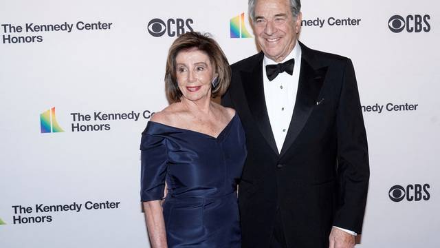 FILE PHOTO: Speaker of the House Nancy Pelosi (D-CA) and her husband Paul Pelosi arrive for the 42nd Annual Kennedy Awards Honors in Washington