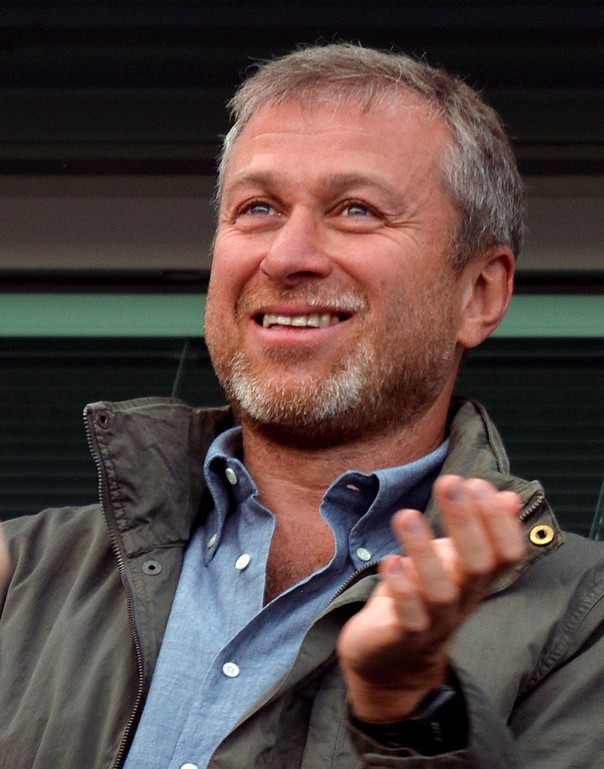 FILE PHOTO: Chelsea owner Roman Abramovich applauds after the English Premier League soccer match between Chelsea and Hull City in London