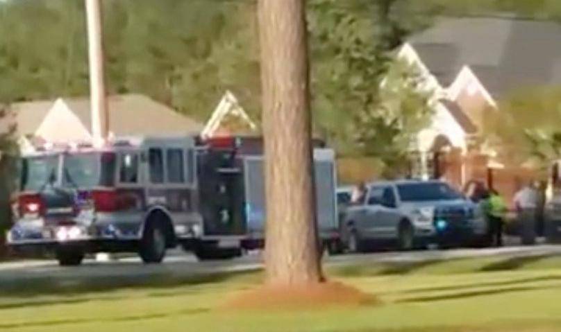 Emergency personnel are seen on site in the aftermath of a shooting in Florence, South Carolina
