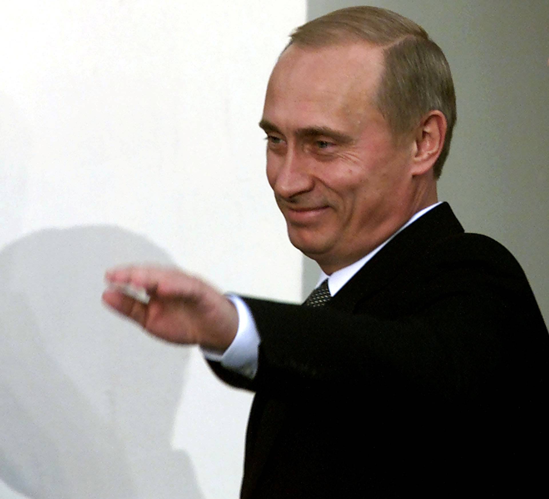 FILE PHOTO: Russian President Vladimir Putin gestures during a ceremony opening a new Jewish community centre in Moscow