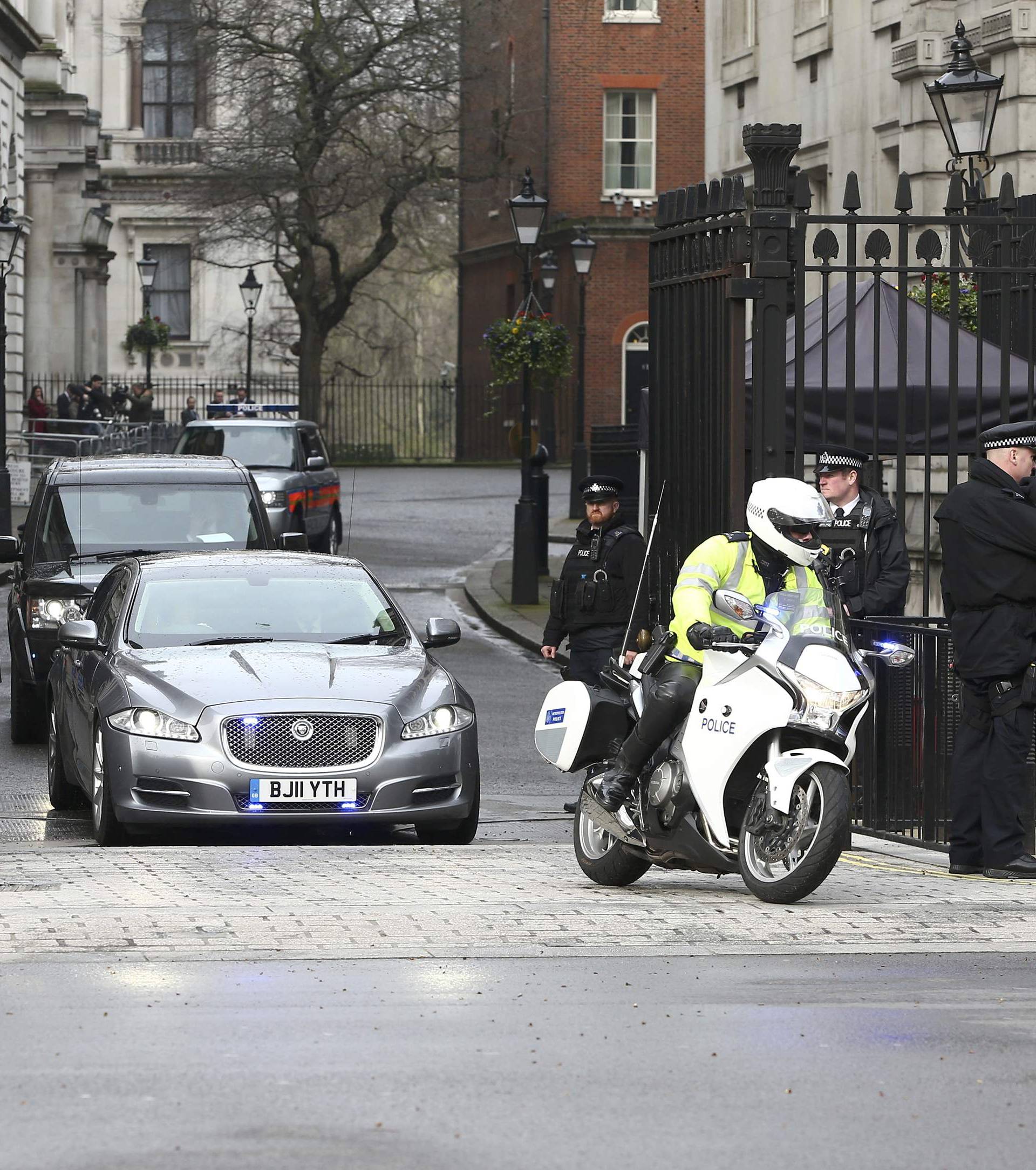 Britain's Prime Minister is driven out of Downing Street the morning after an attack by a man driving a car and weilding a knife left five people dead and dozens injured, in London