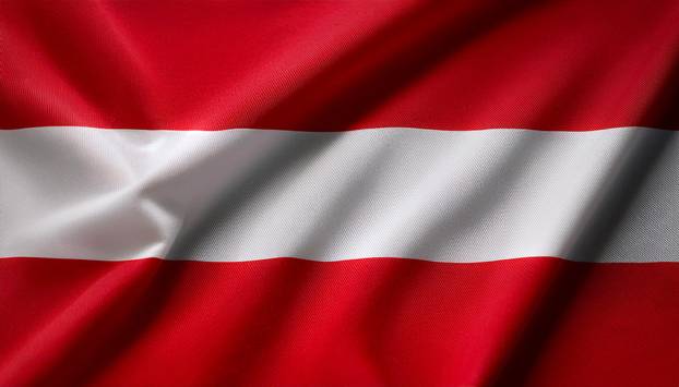 Austria flag waving in the wind. Close up of Austria banner blowing, soft and smooth silk. Cloth fabric texture ensign background. Use it for national day and country occasions concept