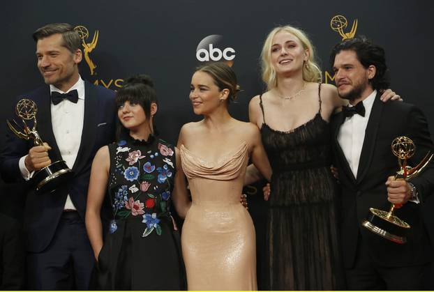 Cast of "Game of Thrones" pose backstage with their awards at the 68th Primetime Emmy Awards in Los Angeles, California