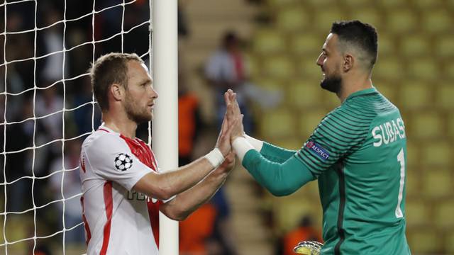 Monaco's Danijel Subasic and Valere Germain at the end of the match