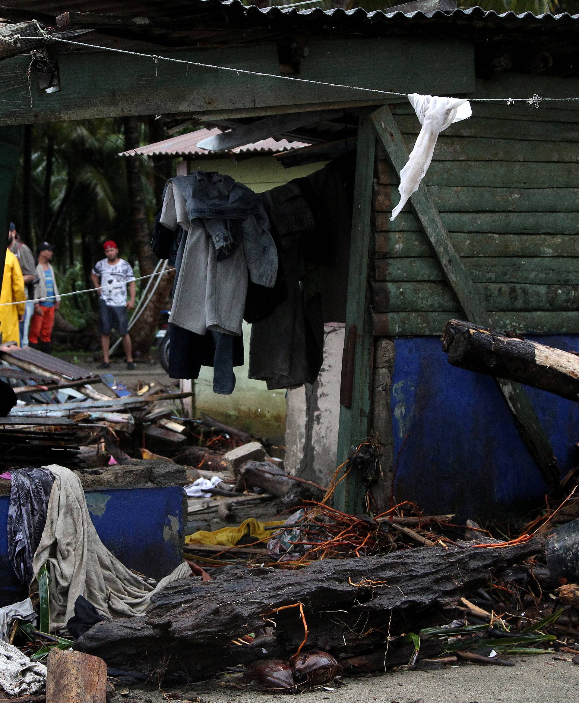 A damaged house is pictured as Hurricane Irma moves off the northern coast of the Dominican Republic, in Nagua