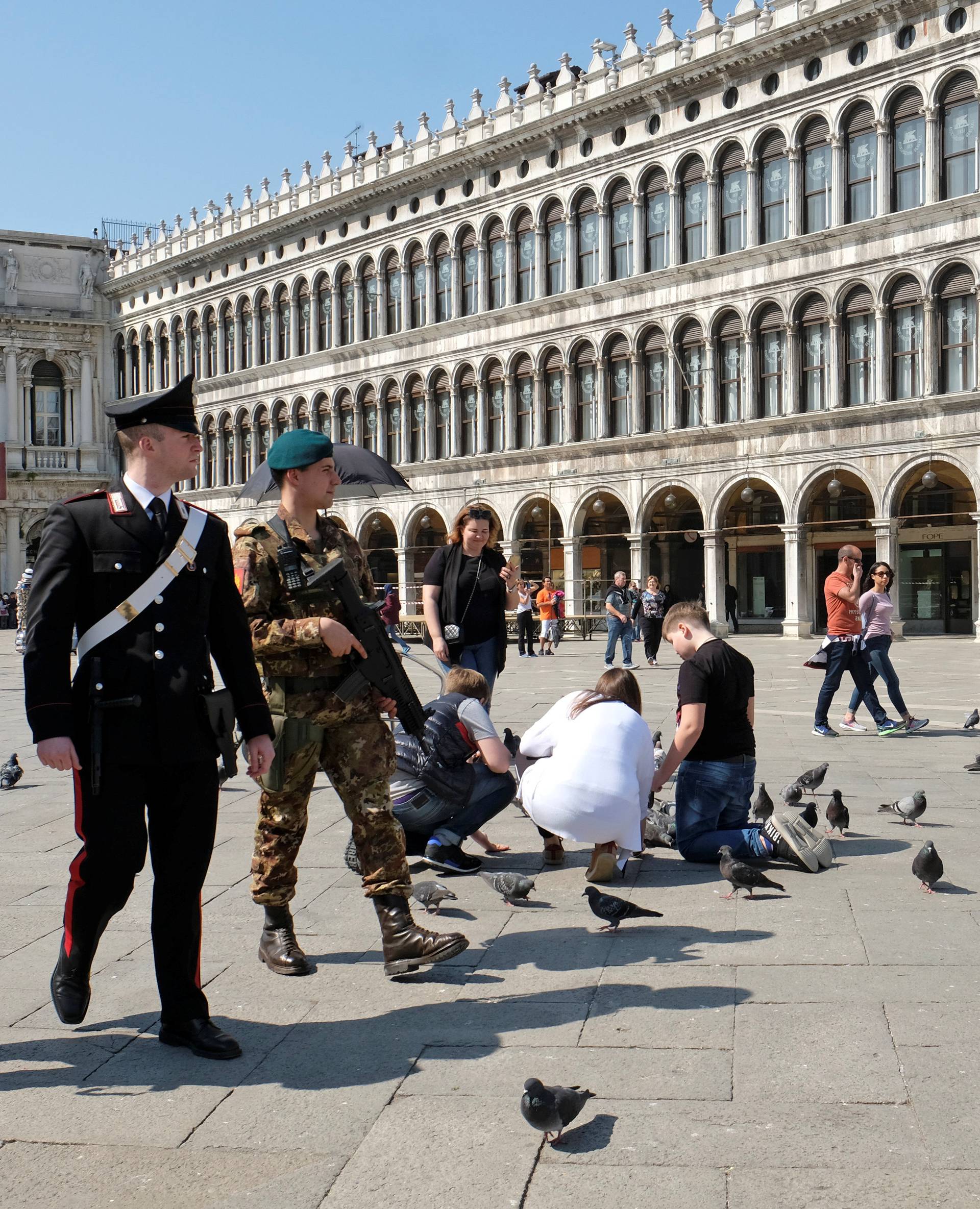 Soldiers patrol Saint Mark's Square in Venice