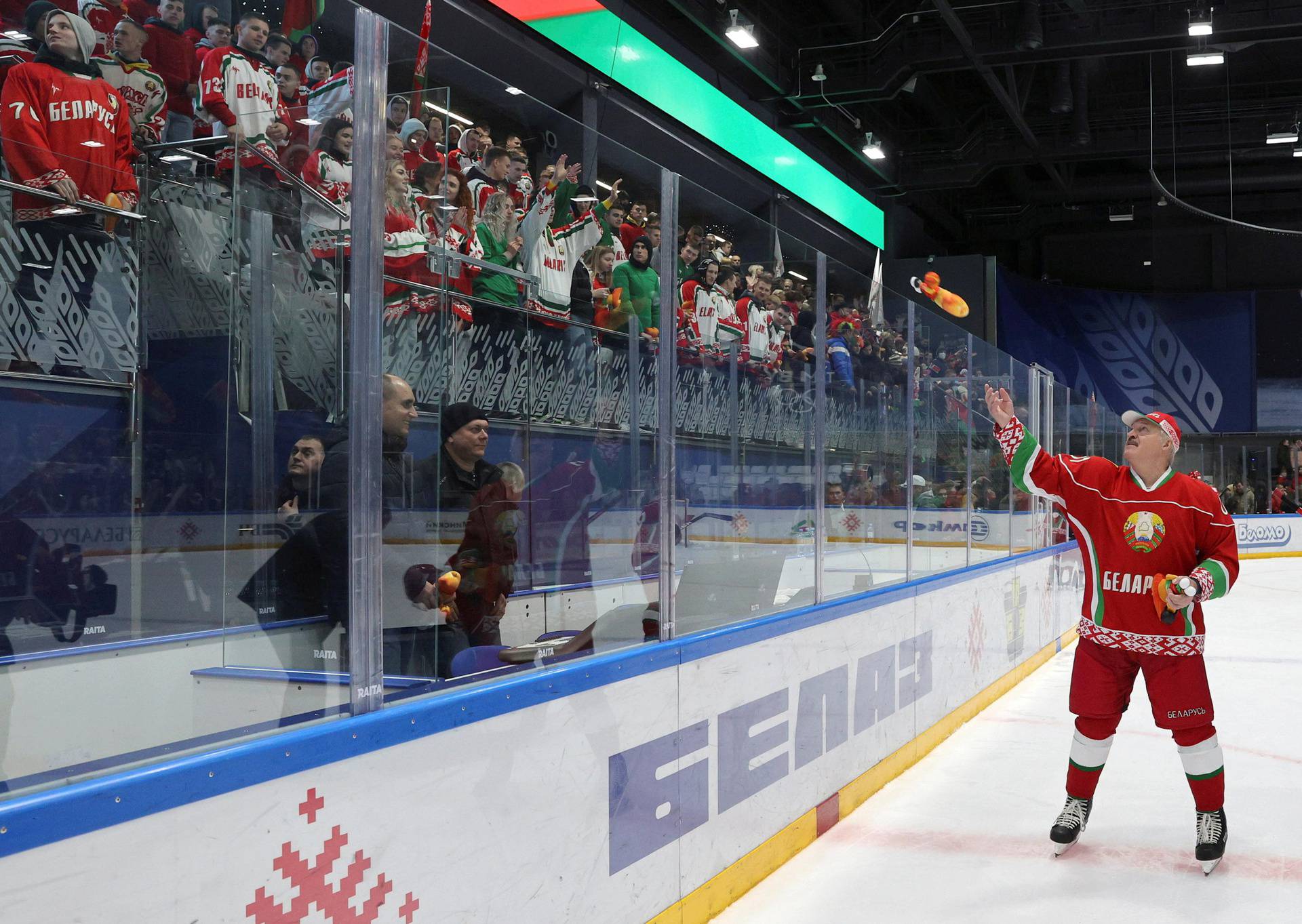 Belarusian President Alexander Lukashenko takes part in a hockey match