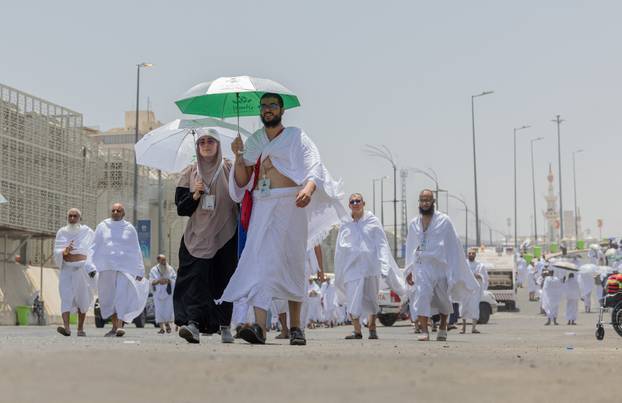 Muslims make their way to Mina during hajj pilgrimage from the holy city of Mecca, Saudi Arabia