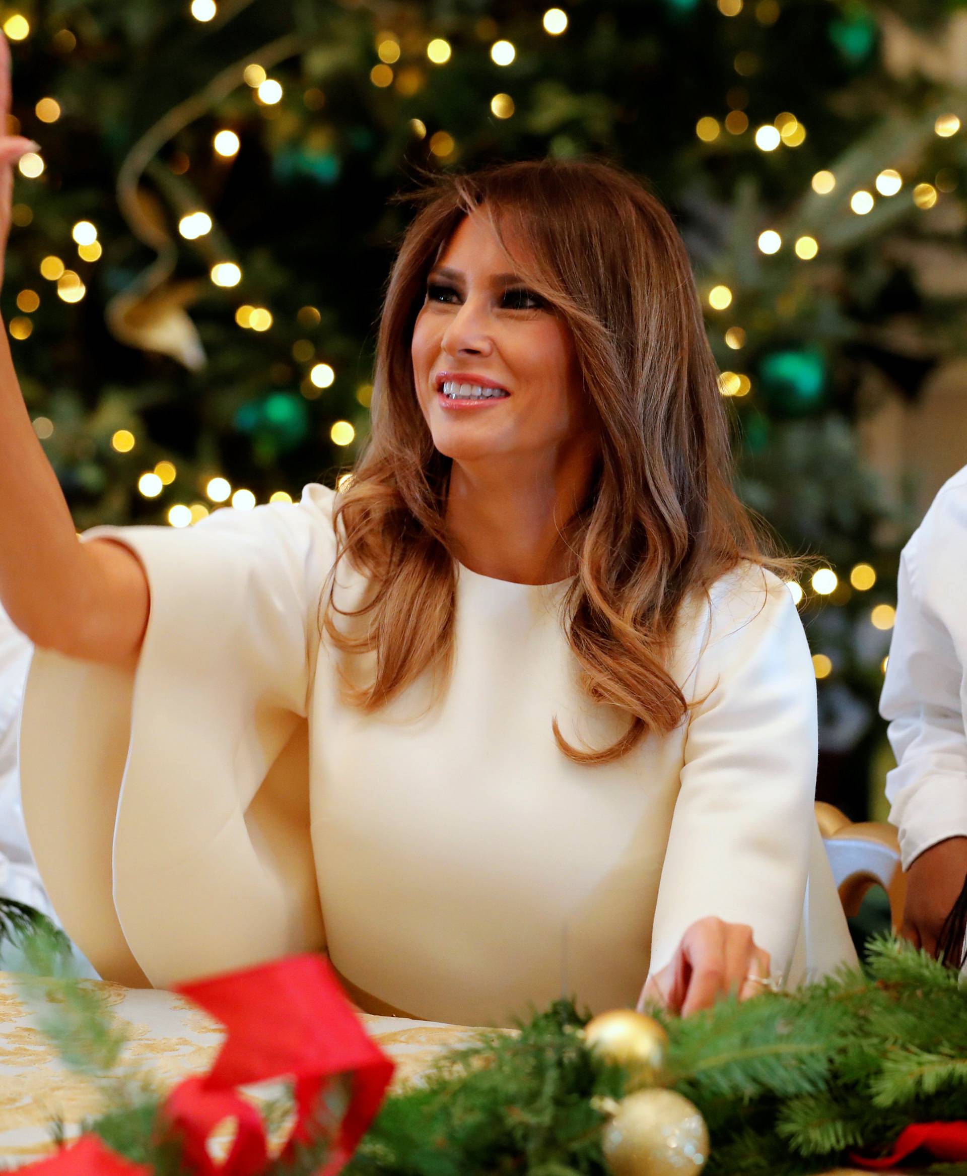 Trump tours the holiday decorations with reporters at the White House in Washington