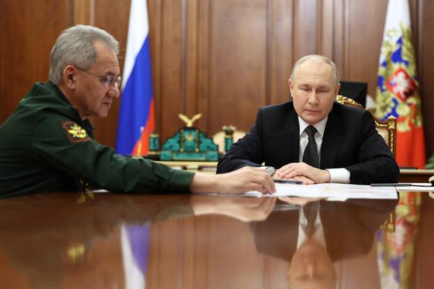 Russia's President Putin and Defence Minister Shoigu meet in Moscow