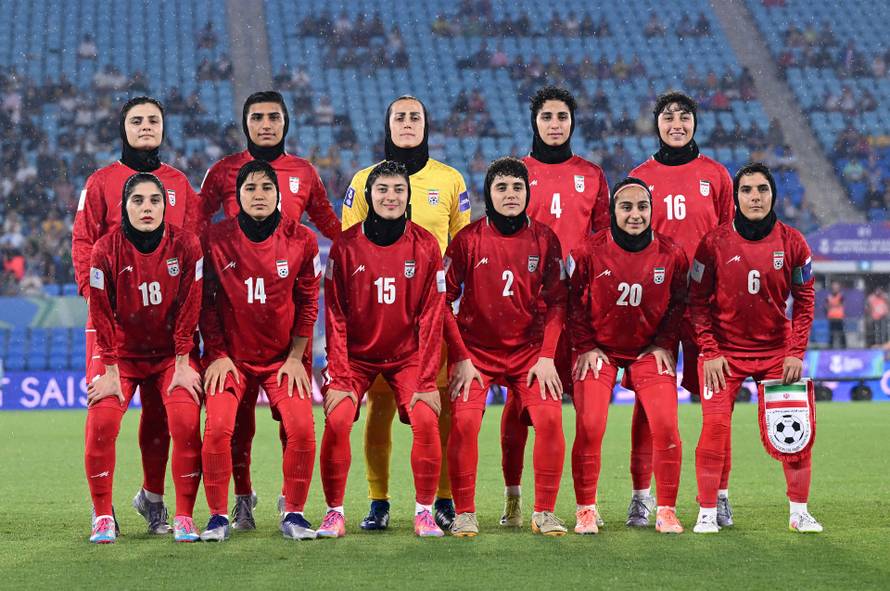 Iran players pose prior to the AFC Women’s Asian Cup Group A match between Iran and Philippines at Gold Coast Stadium