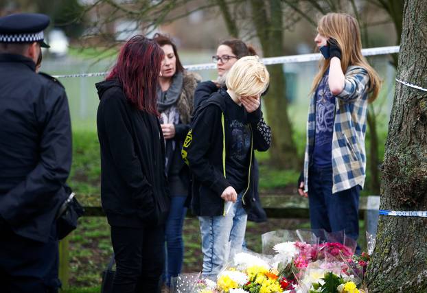 People visit  a site near to where 17-year-old Jodie Chesney was killed, at the Saint Neots Play Park in Harold Hill, east London