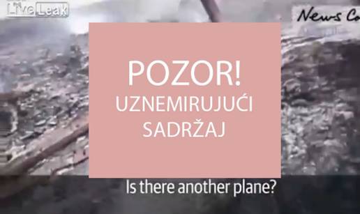 Pad aviona MH17:  Separatisti kopali po stvarima poginulih