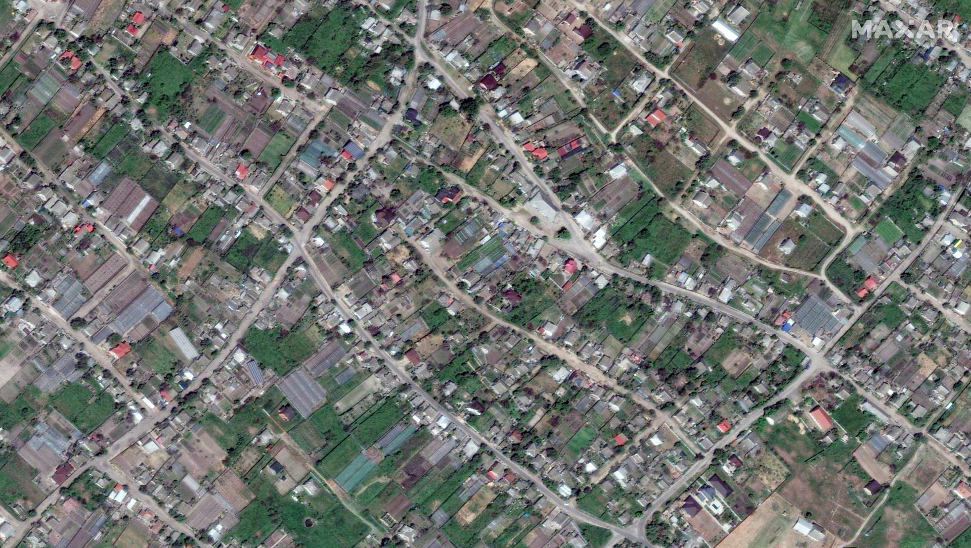 A satellite image shows the town of Oleshky