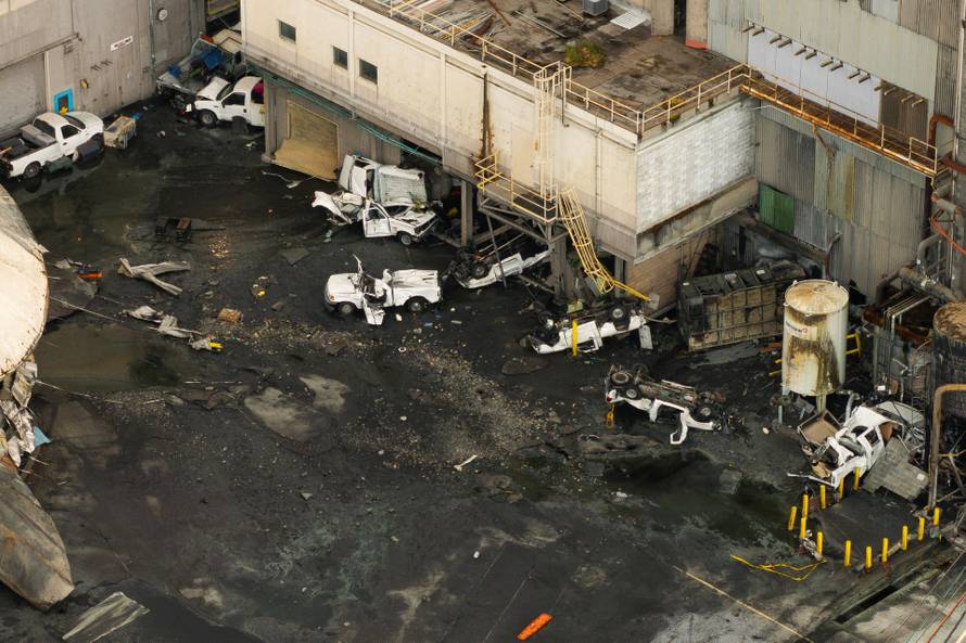Aftermath of a chemical tank rupture at the Nippon Dynawave Packaging pulp and paper mill in Longview