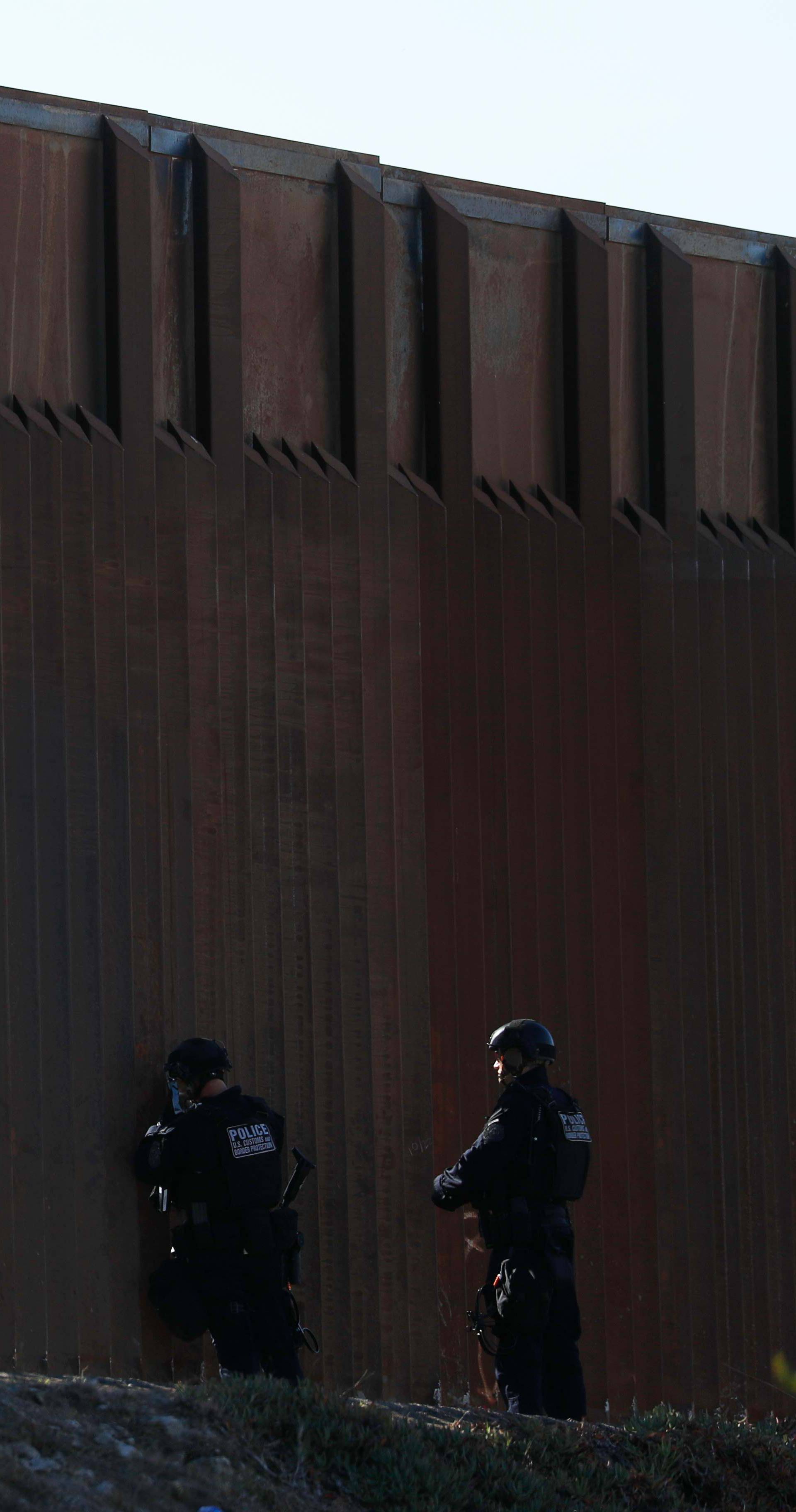 Customs and Border Protection officers patrol the San Ysidro border crossing after the border between Mexico and the U.S. was closed in the San Ysidro neighborhood of San Diego