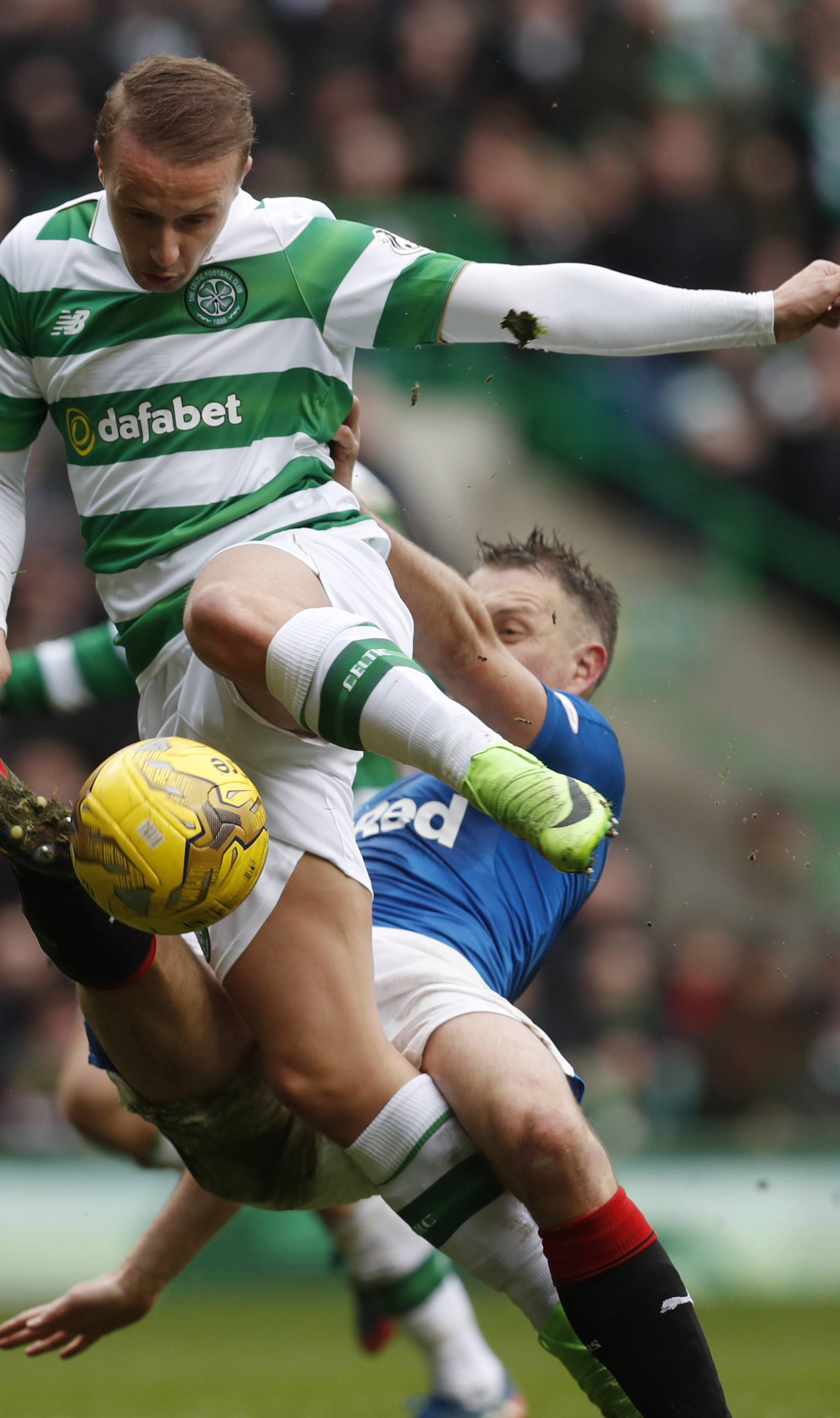 Rangers' Clint Hill in action with Celtic's Leigh Griffiths