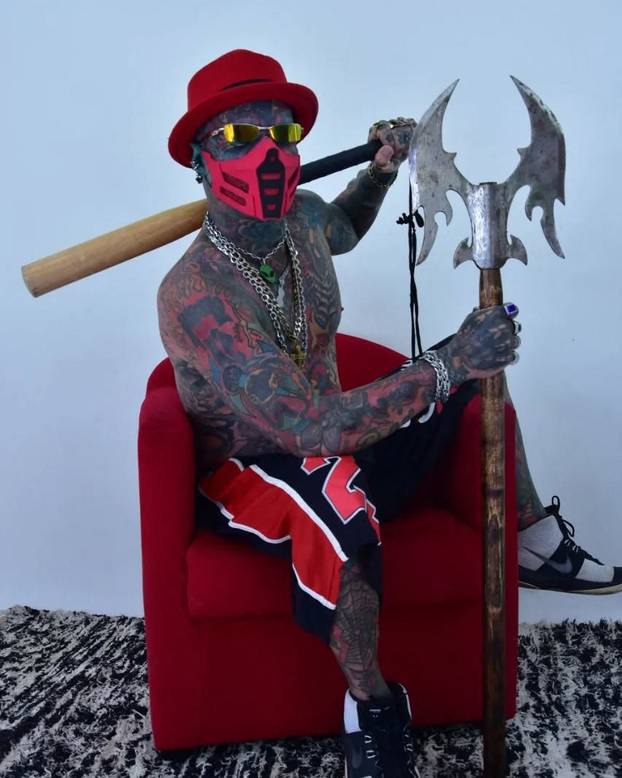 EXCLUSIVE: 'Most modified man in the world' holds TOOTHBRUSH and sunglasses in stretched NOSTRILS after chopping off fingers