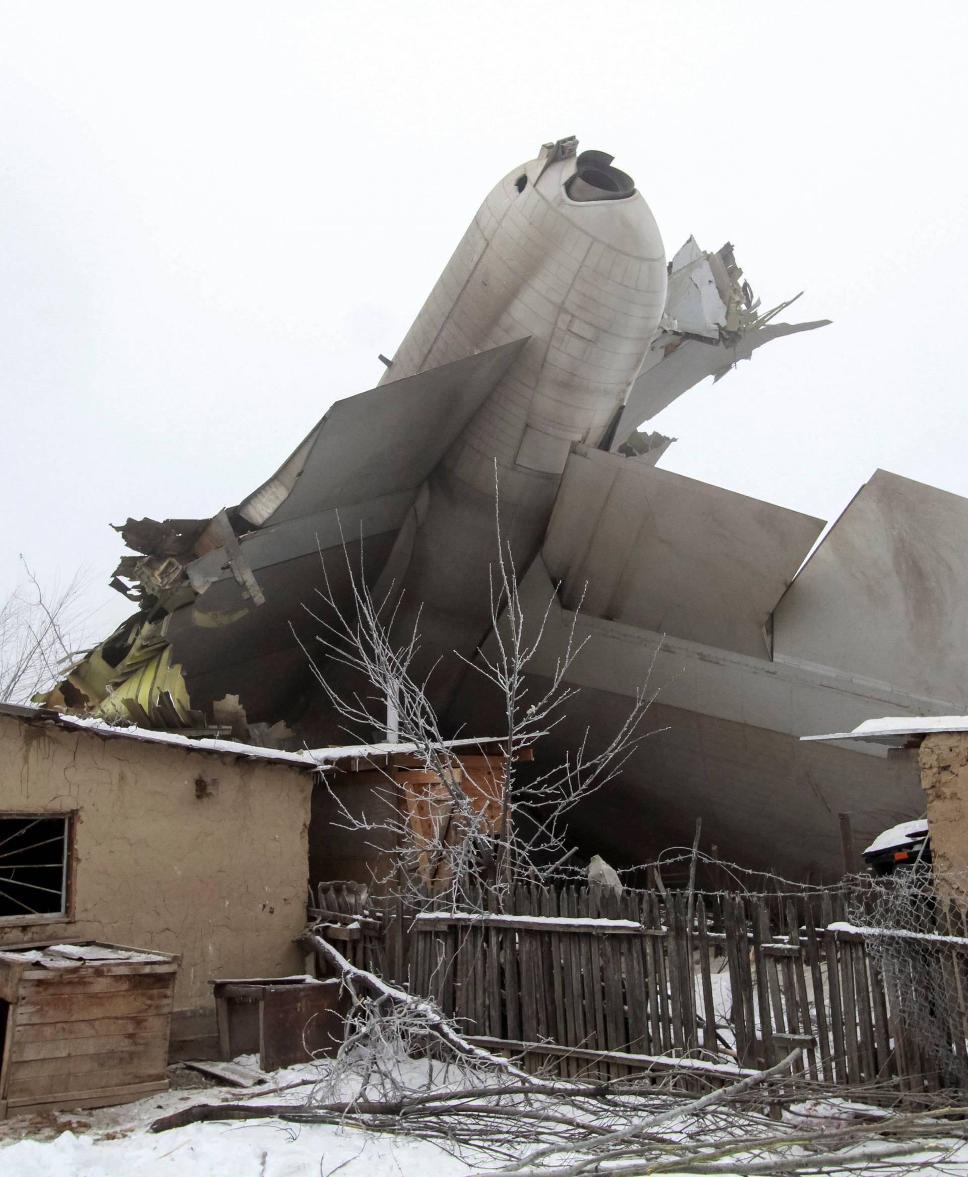 Plane debris is seen at the crash site of a Turkish cargo jet near Kyrgyzstan's Manas airport outside Bishkek