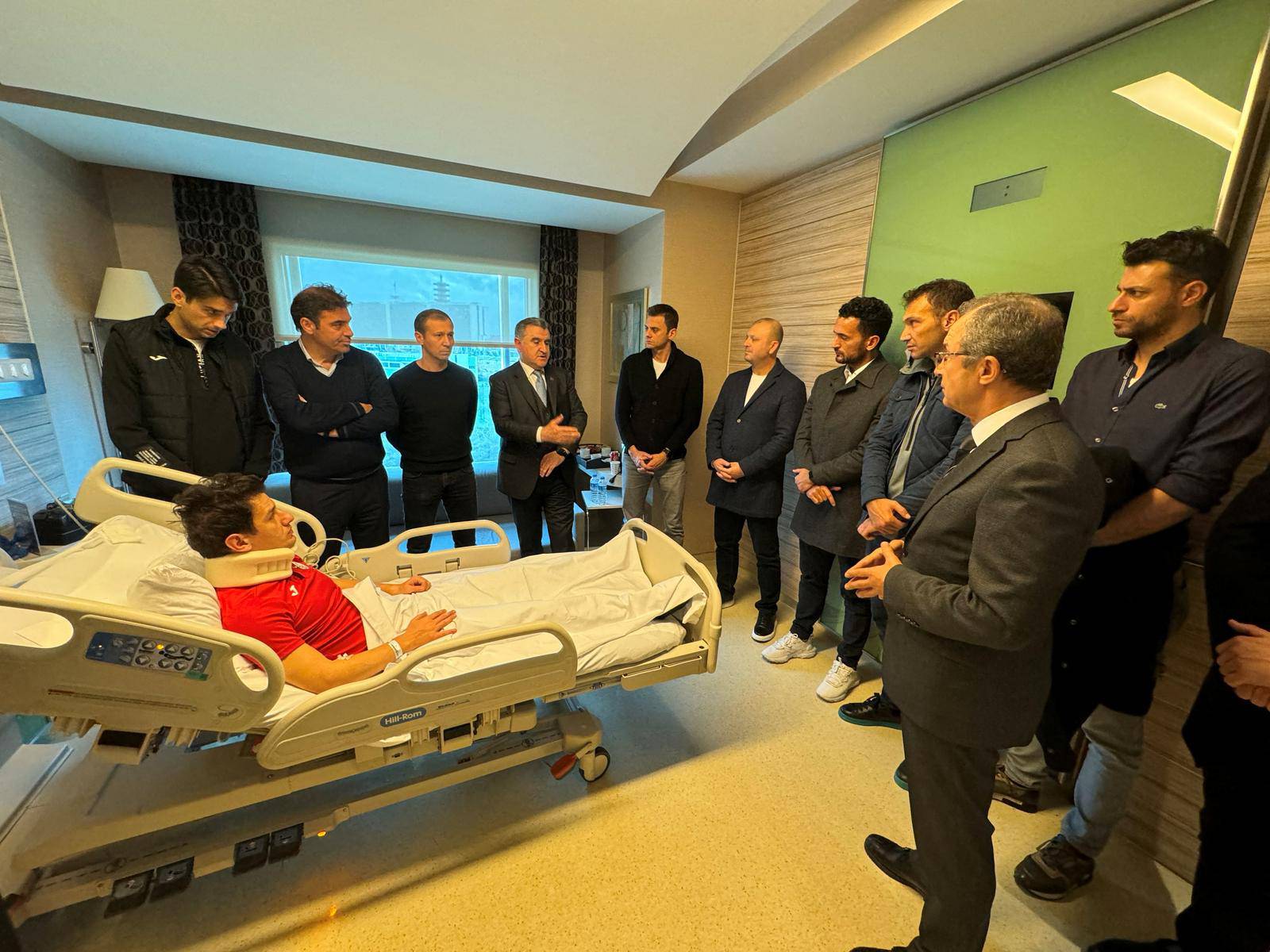 Turkey's Minister of Youth and Sports Osman Askin Bak visits referee Halil Umut Meler at hospital in Ankara