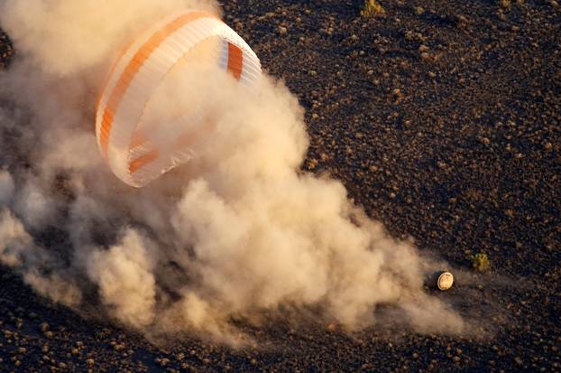 The Soyuz TMA-20M spacecraft capsule carrying International Space Station (ISS) crew lands near the town of Zhezkazgan (Dzhezkazgan), Kazakhstan