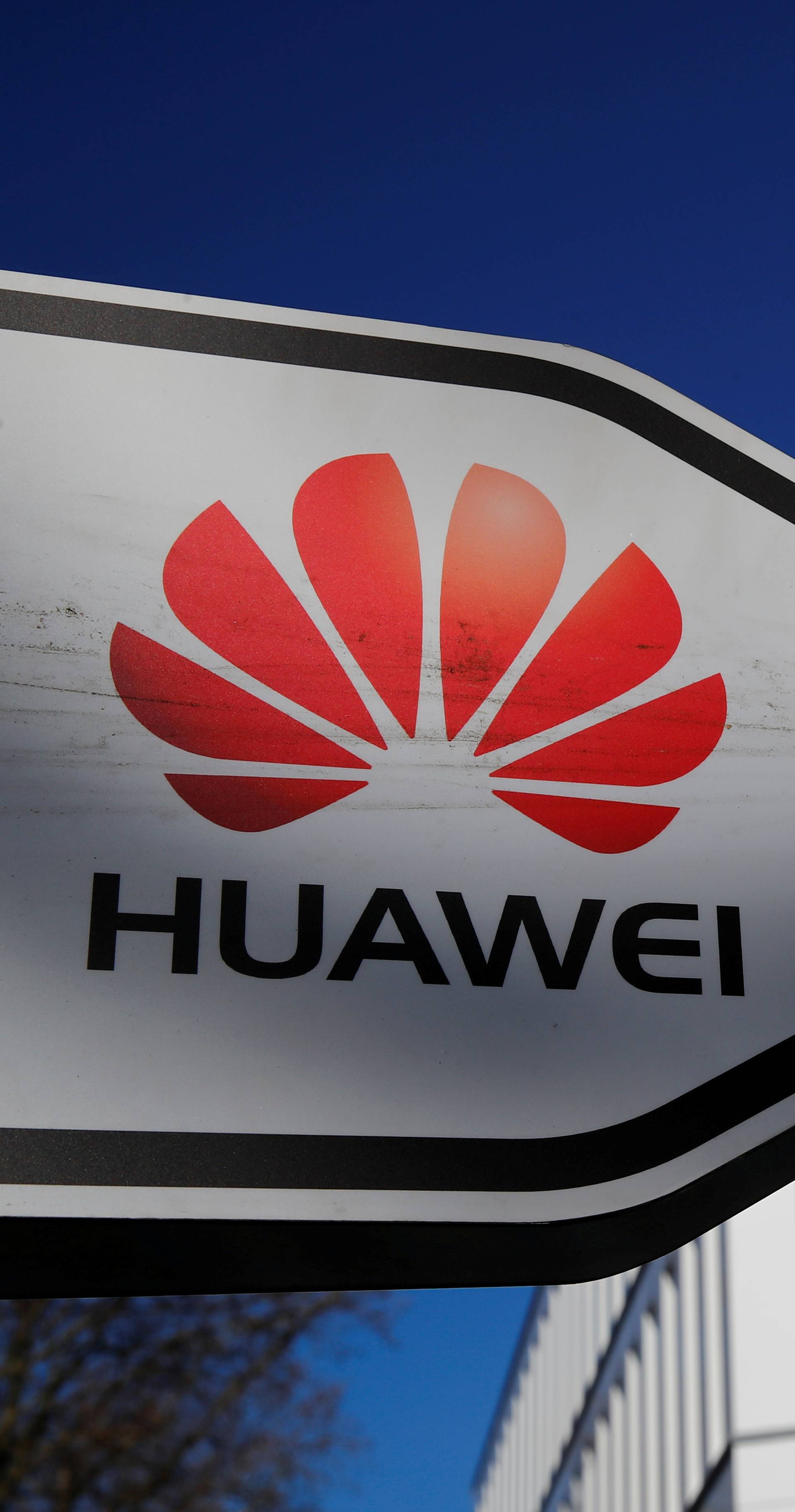 FILE PHOTO: The logo of Huawei Technologies is pictured in front of the German headquarters of the Chinese telecommunications giant in Duesseldorf